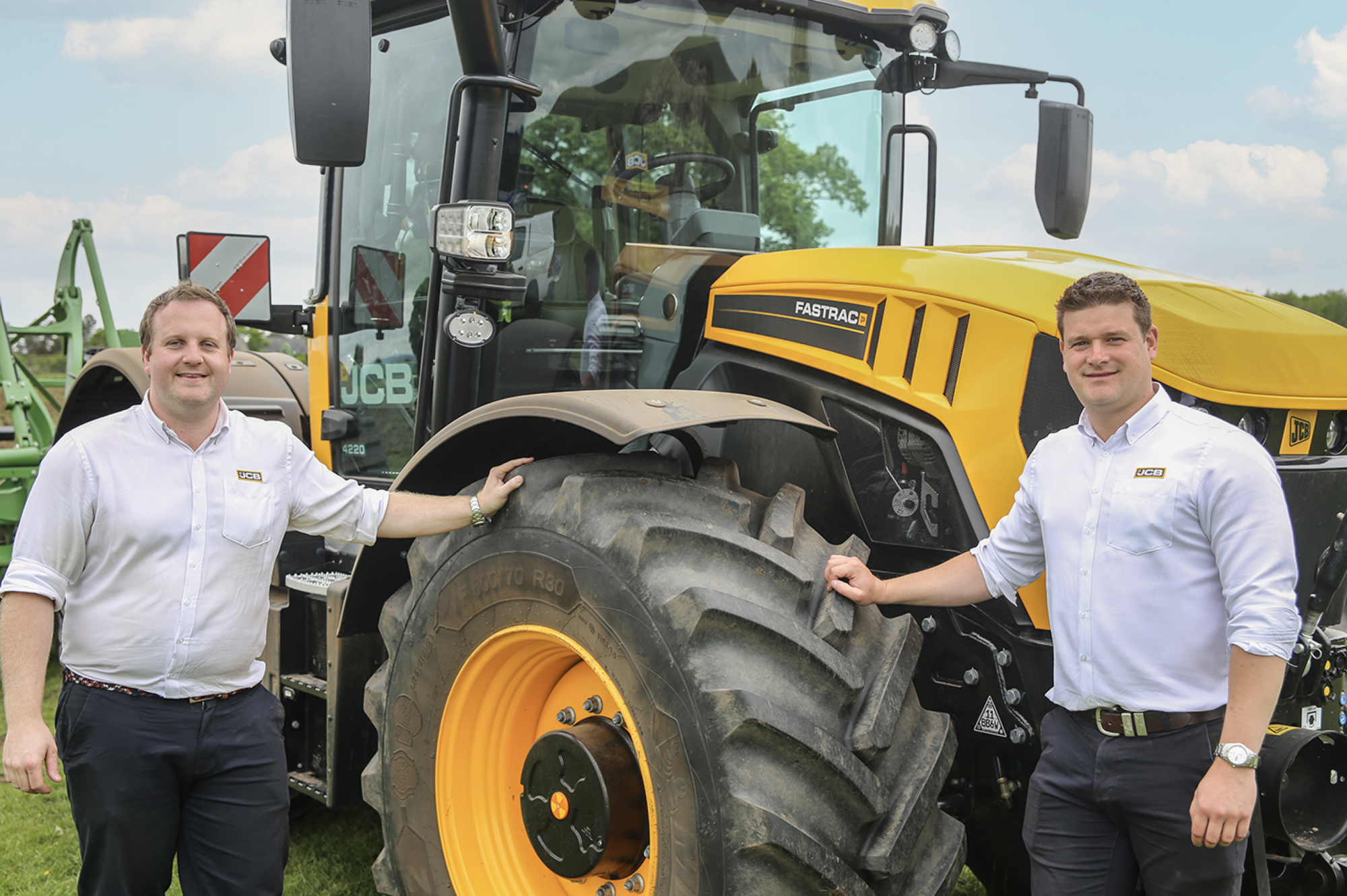  Pictured with the latest 4000-series Fastrac are product specialist Tom Mowforth (left) with James Coxon.